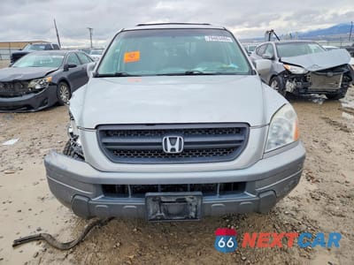 Piąte zdjęcie samochodu w środku: 2005 HONDA PILOT EX VIN:2HKYF18475H526151 - miniatura