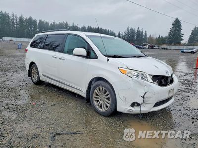 Czwarte zdjęcie samochodu z boku: 2012 TOYOTA SIENNA XLE 8-PASSENGER VIN:5TDYK3DCXCS244579 - miniatura