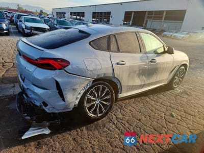 Trzecie zdjęcie samochodu z tyłu: 2026 BMW X6 M60I VIN:5UX43EX05T9344658 - miniatura