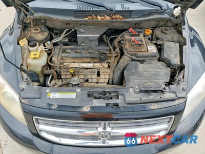 Zdjęcie 11 z 11 samochodu: 2011 DODGE CALIBER MAINSTREET VIN:1B3CB3HA7BD107047 - miniatura