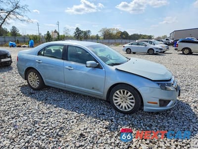 Czwarte zdjęcie samochodu z boku: 2010 FORD FUSION HYBRID VIN:3FADP0L37AR312651 - miniatura