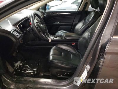 Zdjęcie 7 z 11 samochodu: 2020 FORD FUSION TITANIUM VIN:3FA6P0D93LR176226 - miniatura