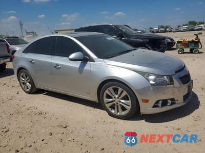 Czwarte zdjęcie samochodu z boku: 2014 CHEVROLET CRUZE LTZ VIN:1G1PG5SB2E7387051 - miniatura