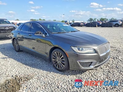 Czwarte zdjęcie samochodu z boku: 2017 LINCOLN MKZ PREMIERE VIN:3LN6L5A91HR633836 - miniatura