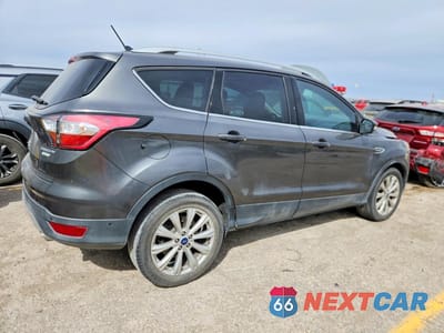 Trzecie zdjęcie samochodu z tyłu: 2018 FORD ESCAPE TITANIUM VIN:1FMCU0J99JUB16785 - miniatura