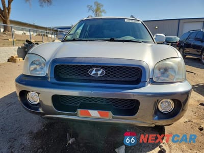 Piąte zdjęcie samochodu w środku: 2002 HYUNDAI SANTA FE GLS VIN:KM8SC73D72U243965 - miniatura