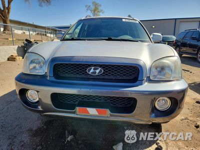 Piąte zdjęcie samochodu w środku: 2002 HYUNDAI SANTA FE GLS VIN:KM8SC73D72U243965 - miniatura