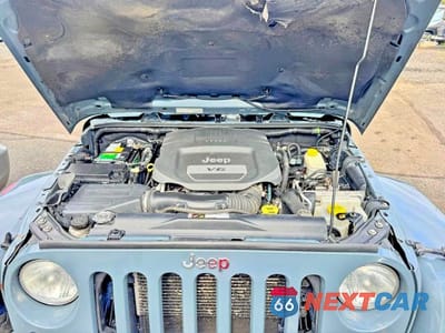 Zdjęcie 7 z 10 samochodu: 2014 JEEP WRANGLER UNLIMITED SAHARA VIN:1C4BJWEG1EL304085 - miniatura