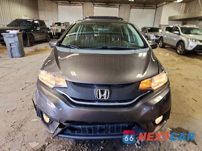 Piąte zdjęcie samochodu w środku: 2015 HONDA FIT EX VIN:3HGGK5G8XFM725355 - miniatura