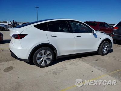 Trzecie zdjęcie samochodu z tyłu: 2023 TESLA MODEL Y VIN:7SAYGDEE9PA199989 - miniatura
