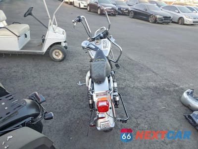 Czwarte zdjęcie samochodu z boku: 2003 HARLEY-DAVIDSON FLHTCUI ANNIVERSARY VIN:1HD1FCW443Y631918 - miniatura