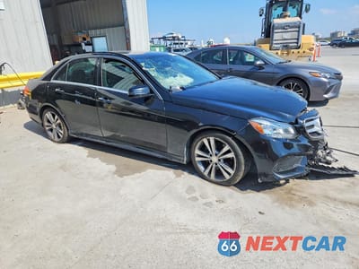 Czwarte zdjęcie samochodu z boku: 2016 MERCEDES-BENZ E 350 VIN:WDDHF5KB2GB202789 - miniatura