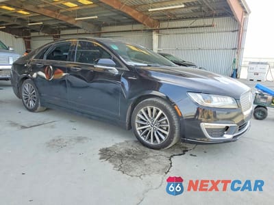 Czwarte zdjęcie samochodu z boku: 2018 LINCOLN MKZ HYBRID SELECT VIN:3LN6L5LUXJR623121 - miniatura