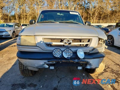 Piąte zdjęcie samochodu w środku: 2004 MAZDA B3000 CAB PLUS VIN:4F4YR16UX4TM00815 - miniatura