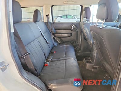 Zdjęcie 11 z 13 samochodu: 2011 DODGE NITRO HEAT VIN:1D4PU4GK9BW598125 - miniatura