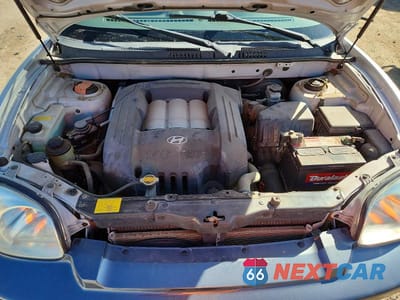 Zdjęcie 11 z 12 samochodu: 2002 HYUNDAI SANTA FE GLS VIN:KM8SC73D72U243965 - miniatura