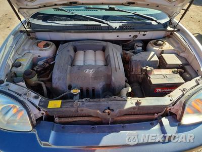 Zdjęcie 11 z 12 samochodu: 2002 HYUNDAI SANTA FE GLS VIN:KM8SC73D72U243965 - miniatura