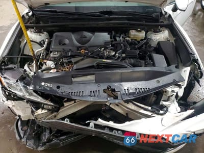 Zdjęcie 11 z 12 samochodu: 2022 TOYOTA CAMRY HYBRID LE VIN:4T1C31AKXNU581464 - miniatura
