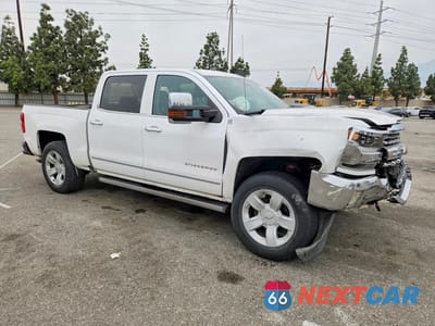 Czwarte zdjęcie samochodu z boku: 2017 CHEVROLET SILVERADO C1500 LTZ VIN:3GCPCSEC3HG124694 - miniatura