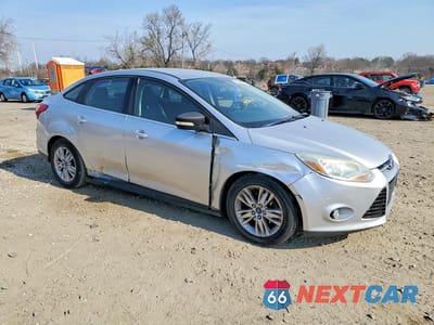 Czwarte zdjęcie samochodu z boku: 2012 FORD FOCUS SEL VIN:1FAHP3H29CL388022 - miniatura