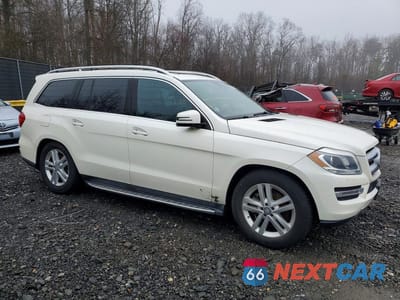 Czwarte zdjęcie samochodu z boku: 2016 MERCEDES-BENZ GL 450 4MATIC VIN:4JGDF6EE6GA661376 - miniatura