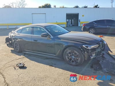 Czwarte zdjęcie samochodu z boku: 2024 BMW I4 EDRIVE 35 VIN:WBY43AW03RFS43977 - miniatura