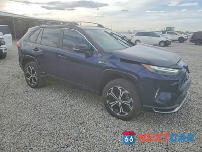 Czwarte zdjęcie samochodu z boku: 2023 TOYOTA RAV4 PRIME XSE VIN:JTMEB3FV2PD159416 - miniatura