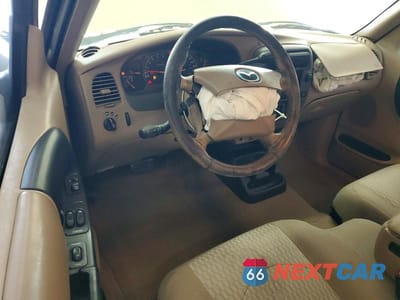 Zdjęcie 8 z 12 samochodu: 2001 MAZDA B4000 CAB PLUS VIN:4F4ZR17E11TM13251 - miniatura