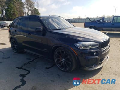 Czwarte zdjęcie samochodu z boku: 2014 BMW X5 SDRIVE35I VIN:5UXKR2C55E0H33851 - miniatura