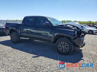 Czwarte zdjęcie samochodu z boku: 2023 TOYOTA TACOMA SR5 V6 VIN:3TMAZ5CN1PM214551 - miniatura