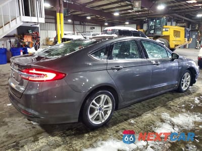 Trzecie zdjęcie samochodu z tyłu: 2018 FORD FUSION SE VIN:3FA6P0HD9JR218278 - miniatura