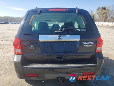 Zdjęcie 6 z 11 samochodu: 2011 MAZDA TRIBUTE I VIN:4F2CY0C74BKM02545 - miniatura