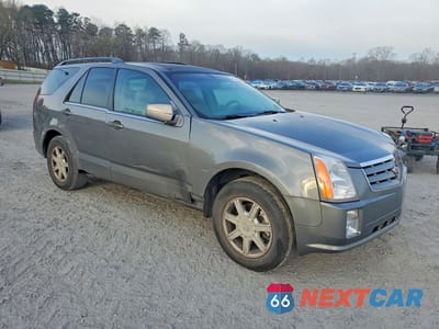 Czwarte zdjęcie samochodu z boku: 2004 CADILLAC SRX VIN:1GYDE637540119144 - miniatura