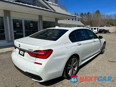 Czwarte zdjęcie samochodu z boku: 2016 BMW 750 XI VIN:WBA7F2C54GG419337 - miniatura