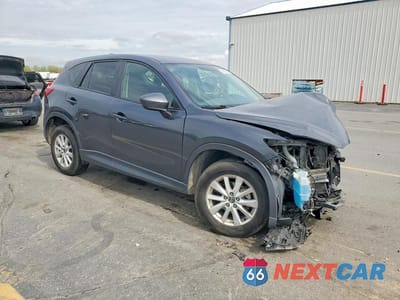 Czwarte zdjęcie samochodu z boku: 2014 MAZDA CX-5 TOURING VIN:JM3KE4CY9E0304672 - miniatura