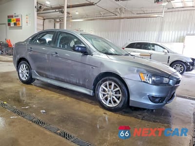 Czwarte zdjęcie samochodu z boku: 2015 MITSUBISHI LANCER ES VIN:JA32U2FU4FU001056 - miniatura