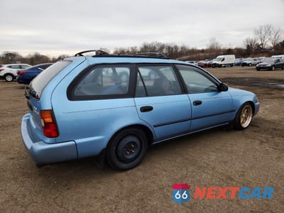 Trzecie zdjęcie samochodu z tyłu: 1993 TOYOTA COROLLA DX VIN:JT2AE09W6P0012881 - miniatura