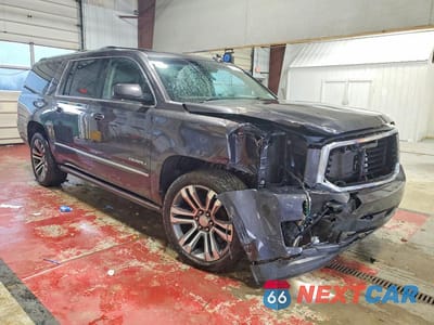 Czwarte zdjęcie samochodu z boku: 2017 GMC YUKON XL DENALI VIN:1GKS2HKJ7HR365911 - miniatura