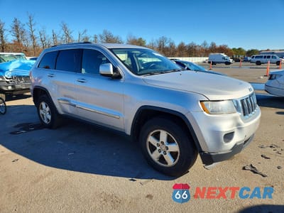 Czwarte zdjęcie samochodu z boku: 2012 JEEP GRAND CHEROKEE VIN:1C4RJFAG2CC263645 - miniatura