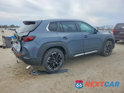 Trzecie zdjęcie samochodu z tyłu: 2024 MAZDA CX-50 BASE VIN:7MMVABXY3RN158035 - miniatura
