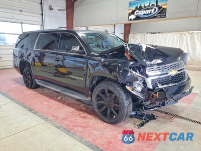 Czwarte zdjęcie samochodu z boku: 2015 CHEVROLET SUBURBAN K1500 LT VIN:1GNSKJKC9FR176332 - miniatura