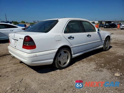 Trzecie zdjęcie samochodu z tyłu: 1999 MERCEDES-BENZ C 43 VIN:WDBHA33G0XF850856 - miniatura