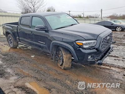 Czwarte zdjęcie samochodu z boku: 2021 TOYOTA TACOMA TRD OFF-ROAD VIN:3TMDZ5BN7MM116022 - miniatura