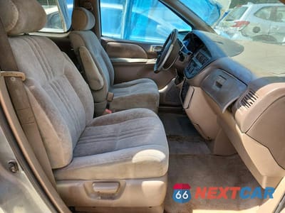 Zdjęcie 7 z 14 samochodu: 2000 TOYOTA SIENNA LE VIN:4T3ZF13C1YU276681 - miniatura