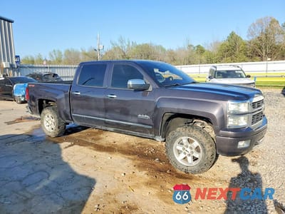 Czwarte zdjęcie samochodu z boku: 2014 CHEVROLET SILVERADO K1500 HIGH COUNTRY VIN:3GCUKTEC8EG348762 - miniatura