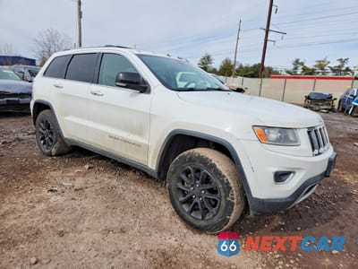 Czwarte zdjęcie samochodu z boku: 2014 JEEP GRAND CHEROKEE VIN:1C4RJFBG6EC431594 - miniatura