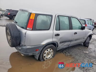 Trzecie zdjęcie samochodu z tyłu: 2001 HONDA CR-V LX VIN:JHLRD18461C052423 - miniatura