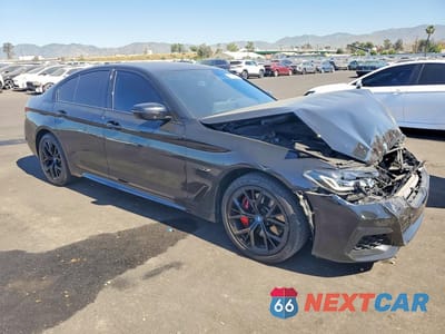 Czwarte zdjęcie samochodu z boku: 2023 BMW 530E VIN:WBA13AG09PCM42255 - miniatura