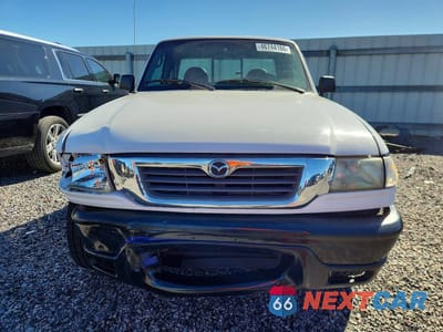 Piąte zdjęcie samochodu w środku: 2003 MAZDA B2300 VIN:4F4YR12D93TM11597 - miniatura