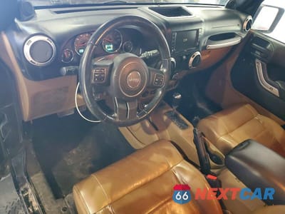 Zdjęcie 8 z 11 samochodu: 2011 JEEP WRANGLER SAHARA VIN:1J4AA5D12BL538454 - miniatura